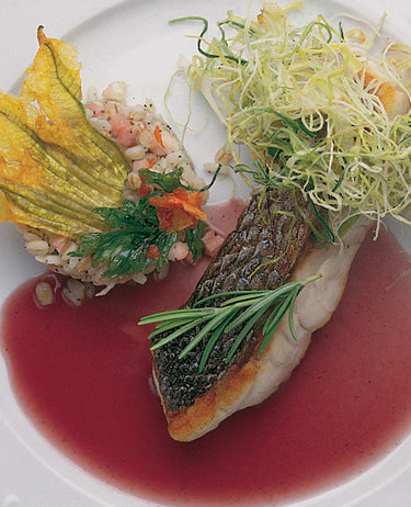 foto ricetta Riso con trancio di branzino dorato 