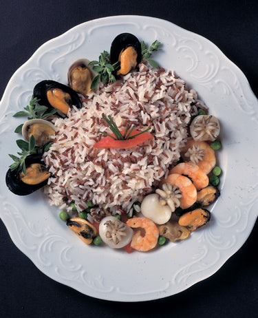 foto ricetta Riso Basmati con frutti di mare e erbe fresche, mantecato all'olio extravergine 