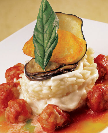 foto ricetta Timballo di riso con melanzane e salsiccia 
