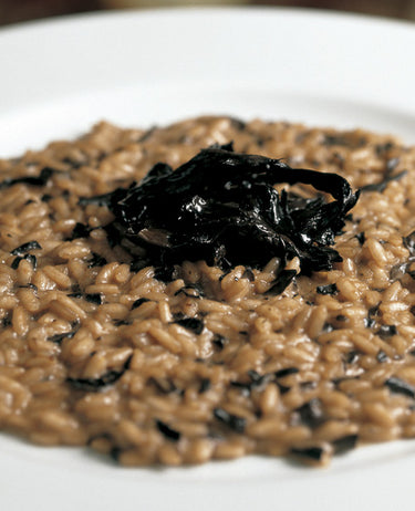 foto ricetta Riso con funghi trombetta e formaggio di capra 