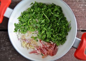 Risotto con Silene, speck di Sauris e ricotta affumicata soffritto