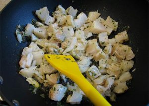 Risotto cremoso allo stokke, olive taggiasche e alici filetti a tocchetti
