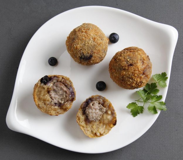 Arancini mirtilli e funghi